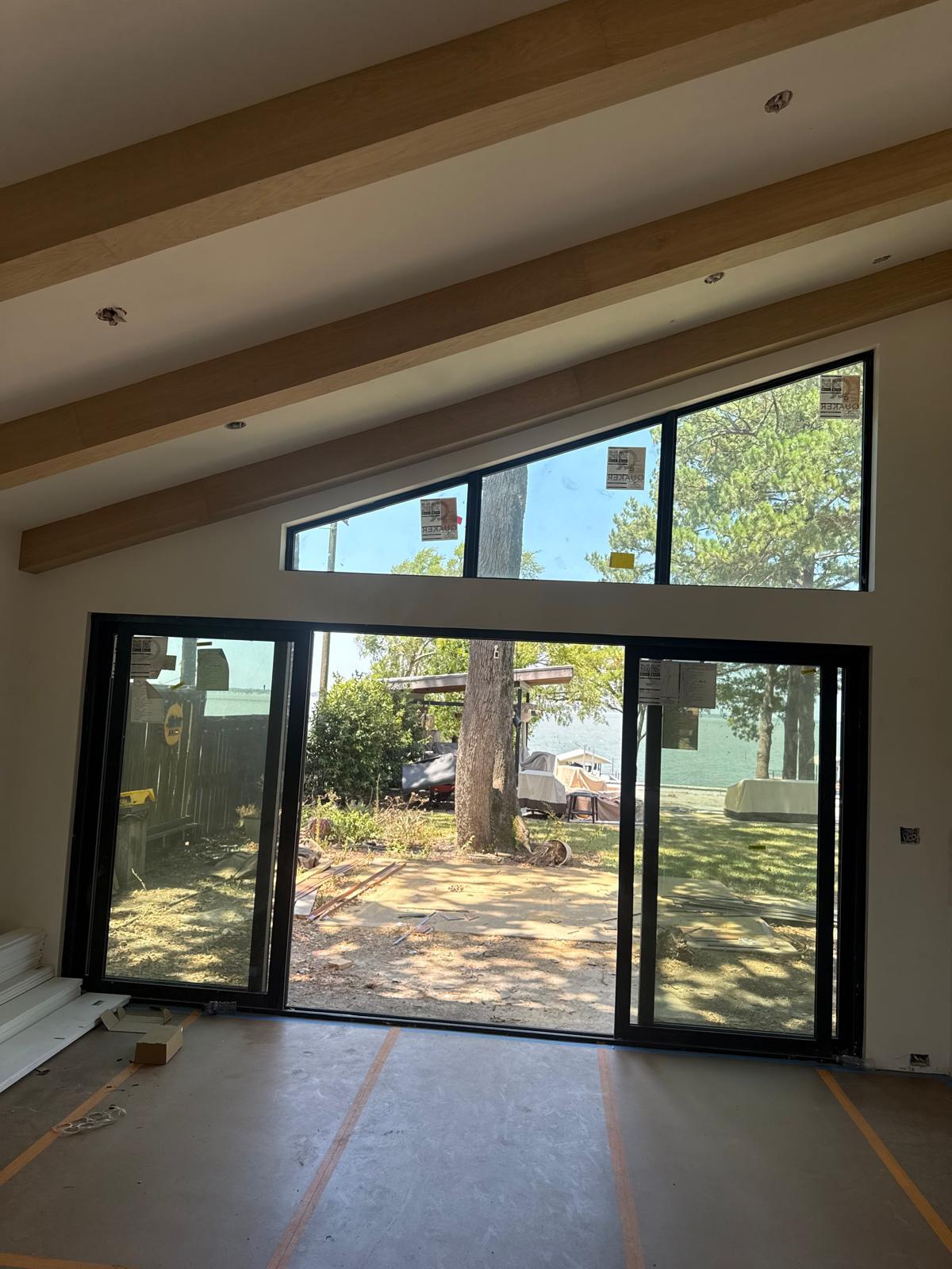 Custom decorative beam work on a residential ceiling
