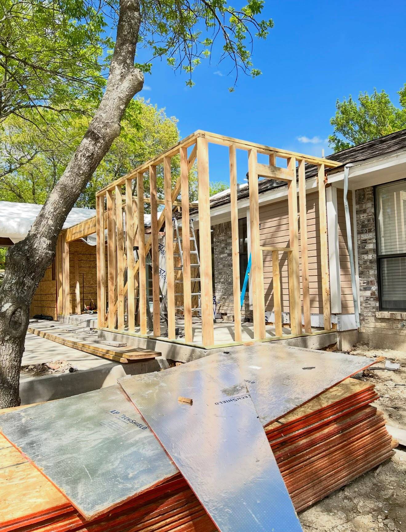 Large structural wood beams being installed in a home